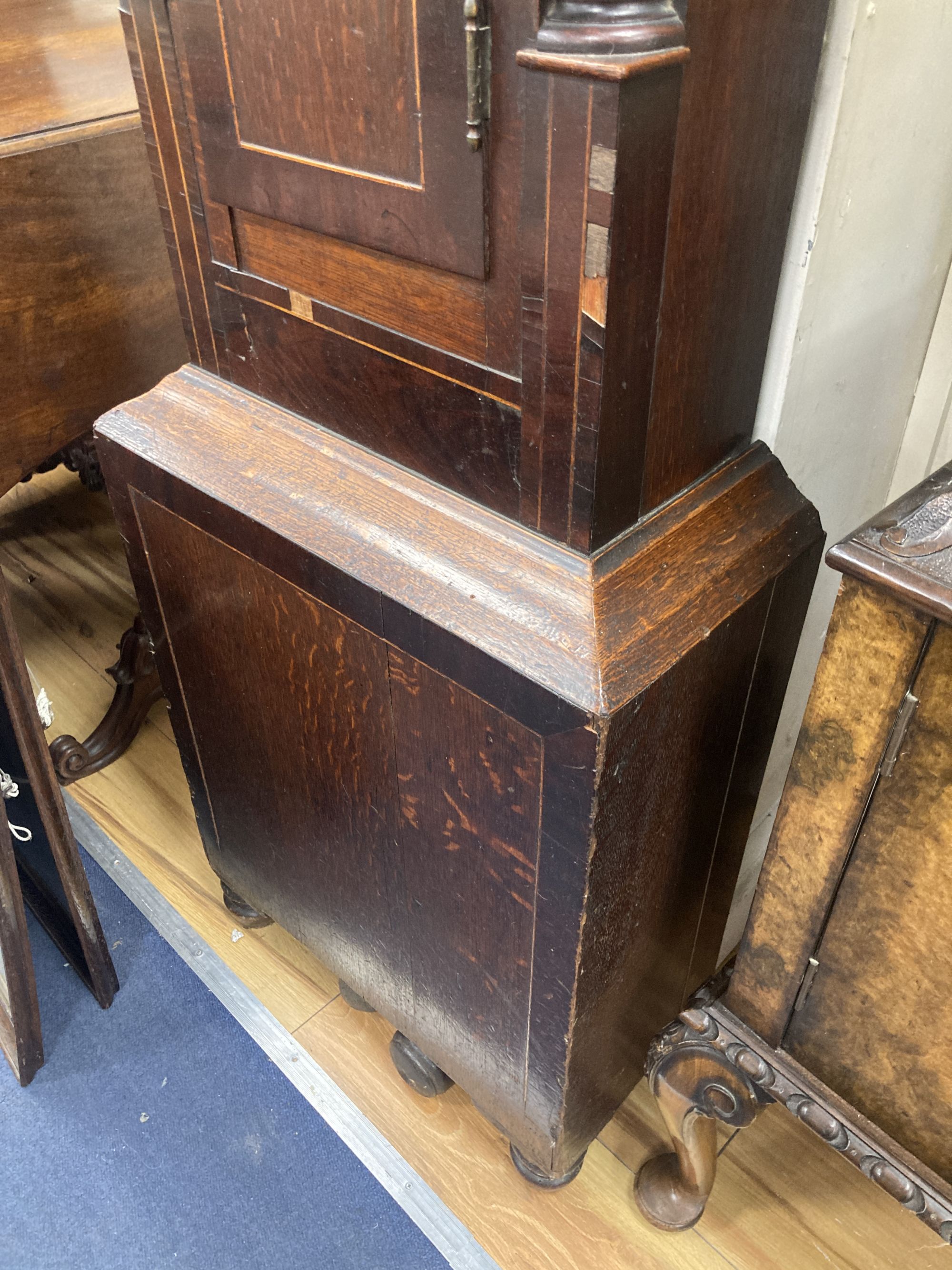 Joseph Humm[ell] of Peterborough. An early 19th century inlaid mahogany and oak eight day longcase clock, height 216cm